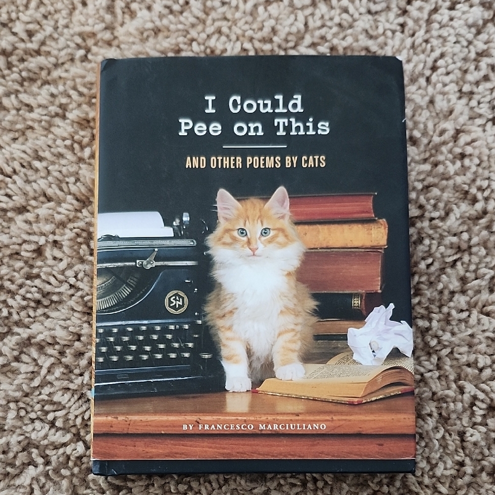 Chronicle Books: Cat Poetry Collection with Cream and Orange Cat